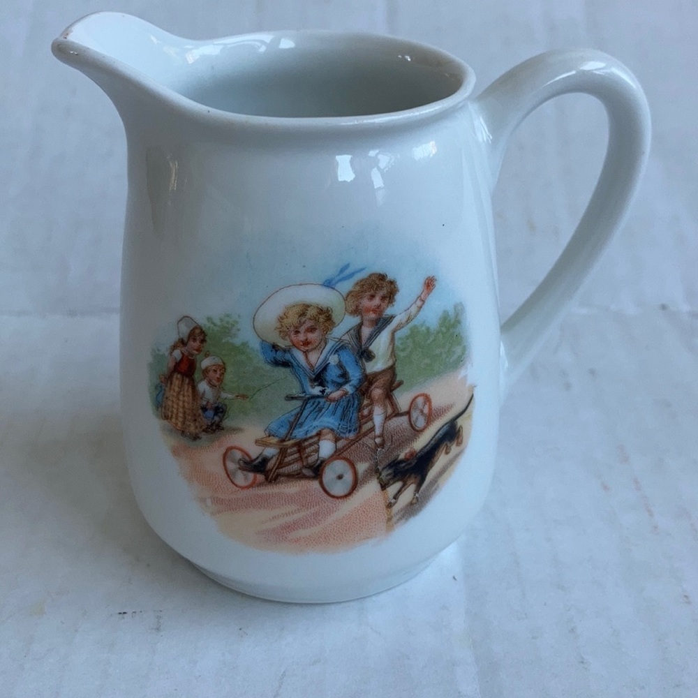 Vtg Germany child's white pitcher dog play